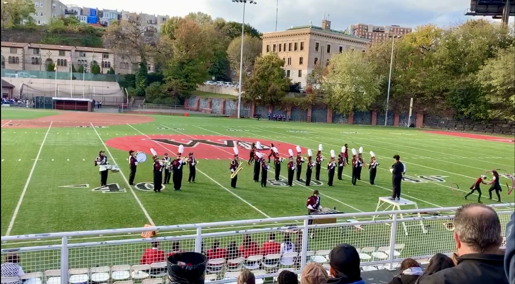 Marching bank plays at Weehawken stadium daytime